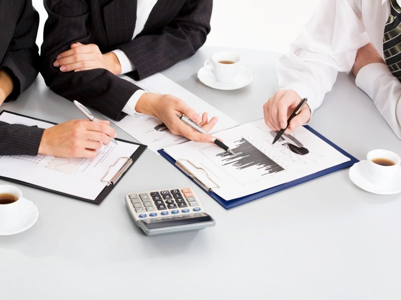 Image of business people hands working with documents at meeting